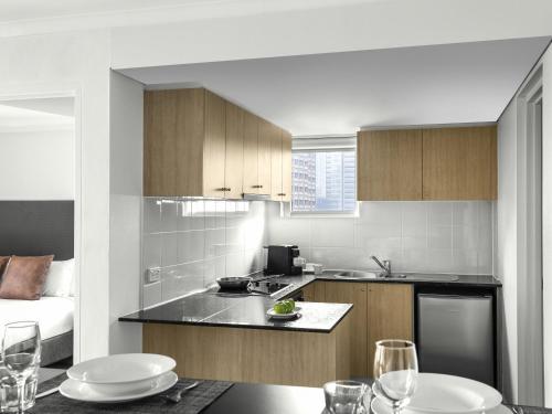 Kuchyň nebo kuchyňský kout v ubytování Mantra on Kent