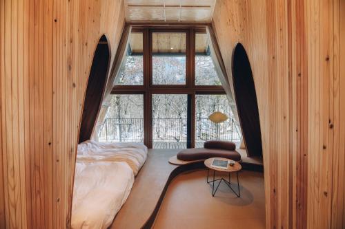 Postel nebo postele na pokoji v ubytování SANU 2nd Home 山中湖1st