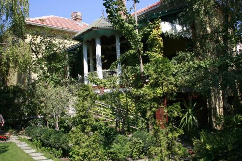 a house with a garden in front of it at Base for Adventurers - Urban Guerrilla in Negotin