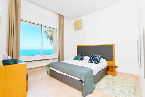 Ένα ή περισσότερα κρεβάτια σε δωμάτιο στο Panorama