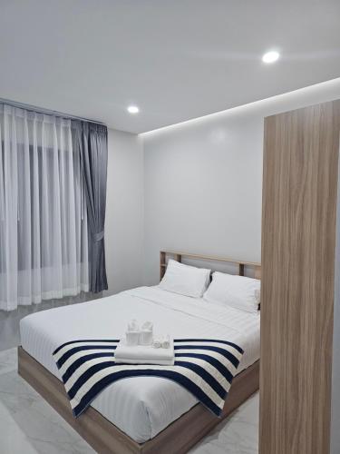 Ένα ή περισσότερα κρεβάτια σε δωμάτιο στο Lua Villa