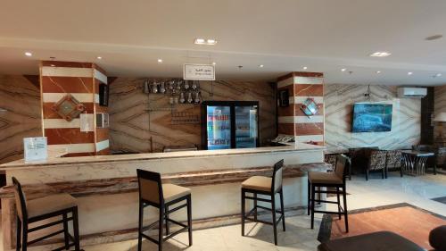 Lounge nebo bar v ubytování اجنحة الفرسان حى الفيصلية اماسي البشاير