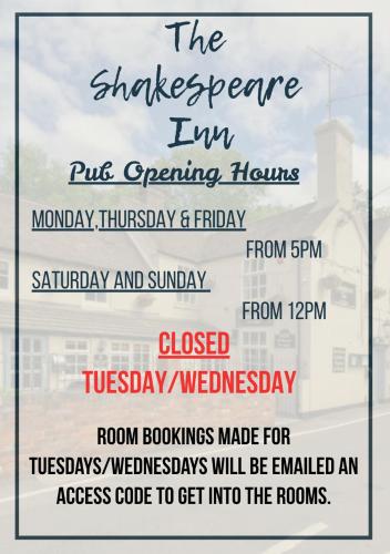 a sign for the shakespeareine inn pub opening hours at The Shakespeare Inn in Coalport