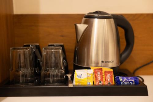 Παροχές για τσάι/καφέ στο Pravasa Stay, Bapat Square