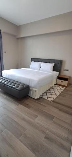 Postel nebo postele na pokoji v ubytování Infinity 2bedroom Newly built Apartment