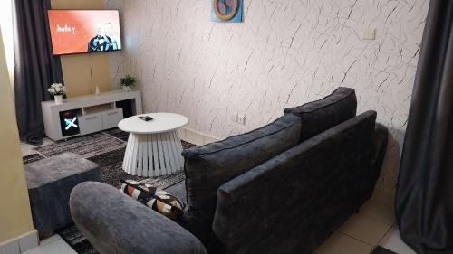 Posezení v ubytování Unique Place Thika 1 Bedroom