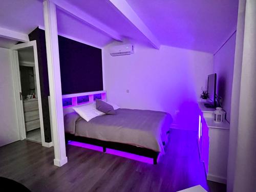 En eller flere senge i et værelse på La Casita del Escorial - Nueva Reforma