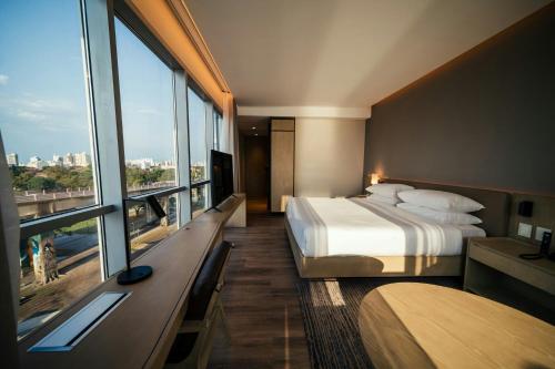 Postel nebo postele na pokoji v ubytování Marriott Corrientes