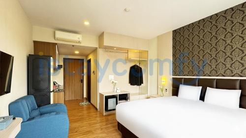 Ένα ή περισσότερα κρεβάτια σε δωμάτιο στο Studio Aston Residence 0206 City View