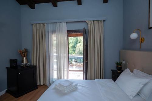 Postel nebo postele na pokoji v ubytování Deluxe Double Room by MANAGR