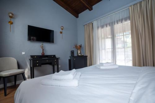 Postel nebo postele na pokoji v ubytování Deluxe Double Room by MANAGR