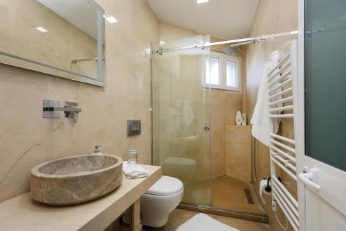 Koupelna v ubytování Hotel Familja