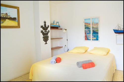 Postel nebo postele na pokoji v ubytování L’Hinerava – Charmant appartement cosy en centre-ville