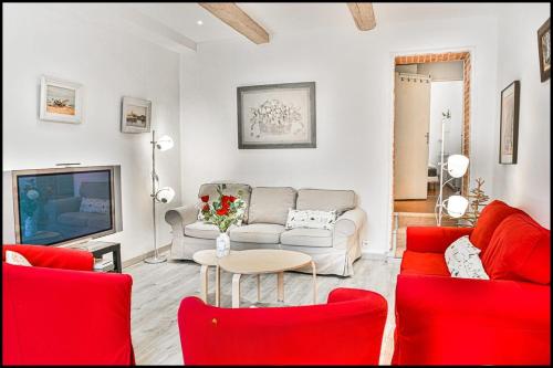 Posezení v ubytování L’Hinerava – Charmant appartement cosy en centre-ville