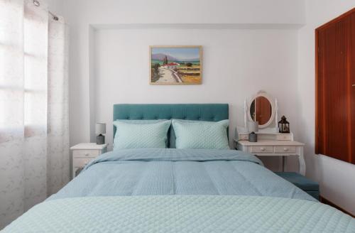 Postel nebo postele na pokoji v ubytování Εν Καρδιά