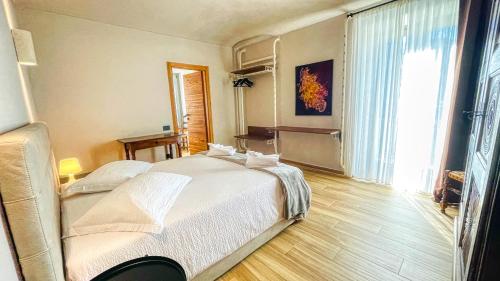 Postel nebo postele na pokoji v ubytování Casa Pozzallo Flavio - Affitti Brevi Italia