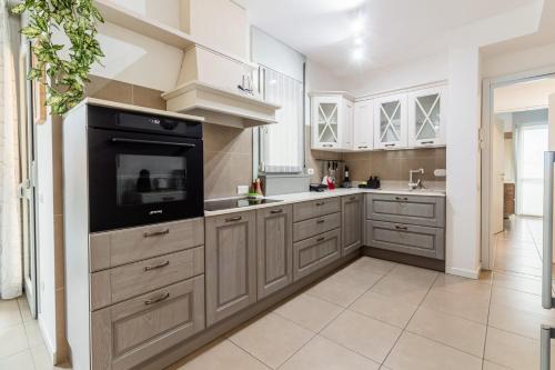 O bucătărie sau chicinetă la Homeby, Appartamento Barbara