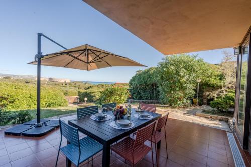 Balkón nebo terasa v ubytování Villetta con Giardino a pochi passi dalla Spiaggia