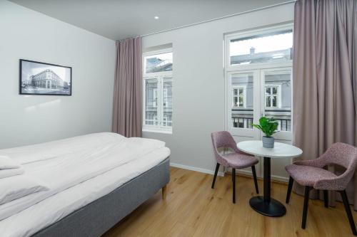 Postel nebo postele na pokoji v ubytování MAYA Apartments - Frogner