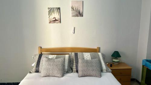 Ένα ή περισσότερα κρεβάτια σε δωμάτιο στο Sol y playa apartamento