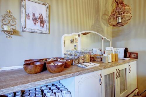 Kuchyň nebo kuchyňský kout v ubytování Hotel de Riu Boutique