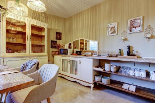 Kuchyň nebo kuchyňský kout v ubytování Hotel de Riu Boutique