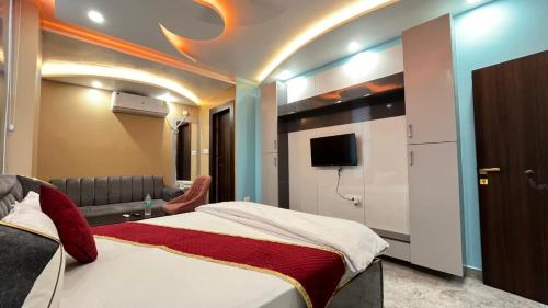 TV a/nebo společenská místnost v ubytování Hotel Anu