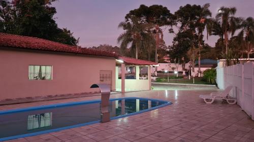 Bazén v ubytování Espaço Carvalho Resort nebo v jeho okolí