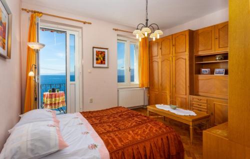 Ένα ή περισσότερα κρεβάτια σε δωμάτιο στο Feelgood apartment Opatija-Rijeka by Villas Guide