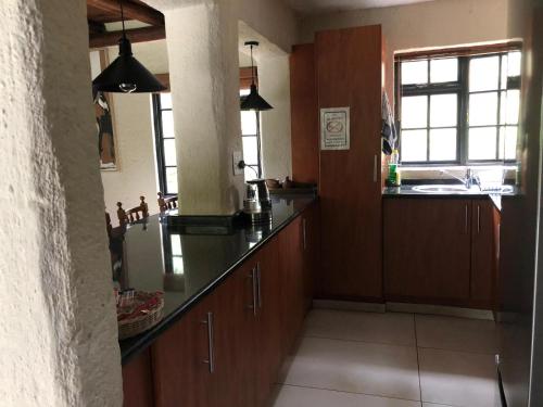 Kuchyň nebo kuchyňský kout v ubytování Silver Mist Resort, Haenertsburg