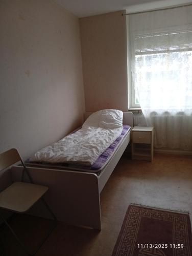 Ένα ή περισσότερα κρεβάτια σε δωμάτιο στο Cozy place