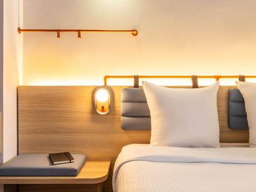 Postel nebo postele na pokoji v ubytování Ibis Styles Brussels Centre Rogier
