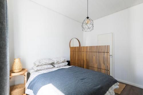 Ένα ή περισσότερα κρεβάτια σε δωμάτιο στο Renovated 1BR Apt in Turku Downtown with Best Location