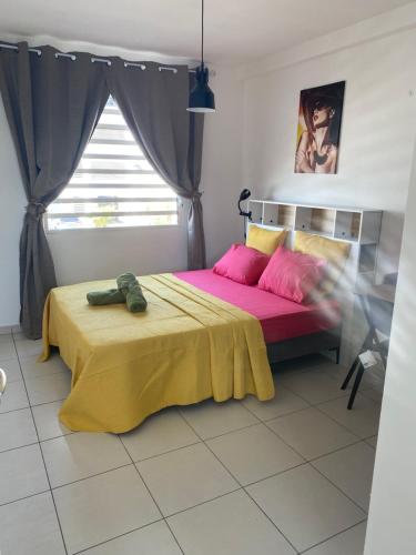 Llit o llits en una habitació de Comme à la maison