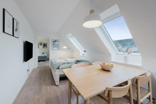 Ένα ή περισσότερα κρεβάτια σε δωμάτιο στο Exclusive 2BR apartment with a focus on comfort