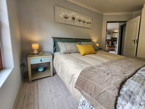 Postel nebo postele na pokoji v ubytování StayC1 Green Oaks