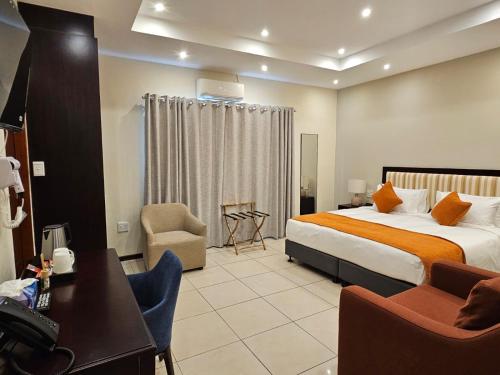 Ένα ή περισσότερα κρεβάτια σε δωμάτιο στο Coastal Boutique Hotel