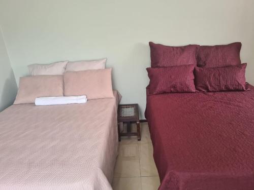 Postel nebo postele na pokoji v ubytování Uptown Inn GuestHouse