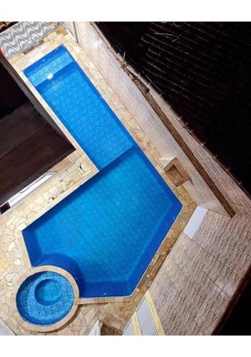 Bazén v ubytování Pousada MakTub Beach House Itanhaém nebo v jeho okolí