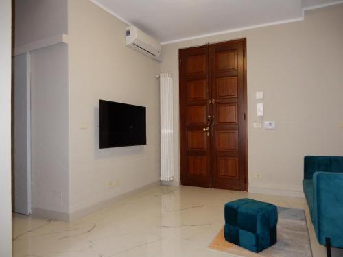 TV a/nebo společenská místnost v ubytování Casa Valentino - Stay in the heart of Asti