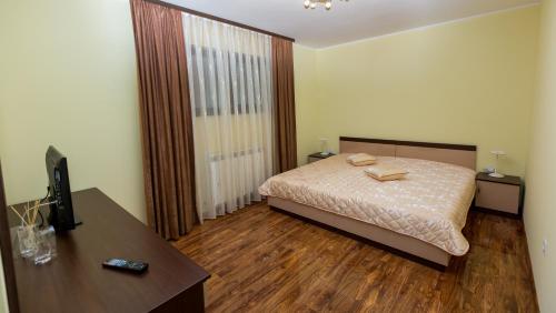 Кровать или кровати в номере Hotel Kristal