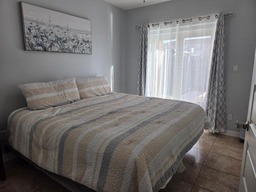 Postel nebo postele na pokoji v ubytování 107 Pike on Oceanside