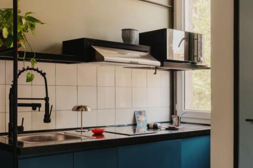 Kuchyň nebo kuchyňský kout v ubytování Brassbell l DT l Hannaux l Tahrir sq