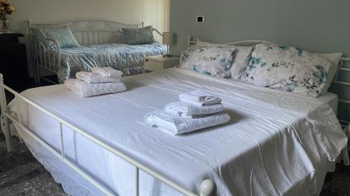 Postel nebo postele na pokoji v ubytování Ka suporti