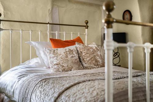 Ένα ή περισσότερα κρεβάτια σε δωμάτιο στο The Angel Inn B&B