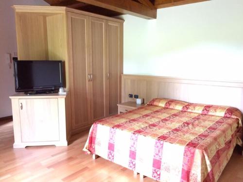 Кровать или кровати в номере B&B Villa Carli