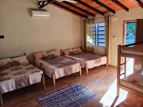 Ένα ή περισσότερα κρεβάτια σε δωμάτιο στο Kitty Roga en IG y FB