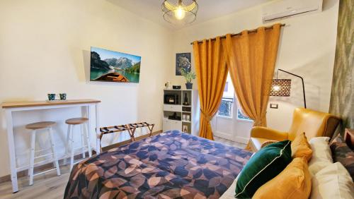 Un pat sau paturi într-o cameră la Green Studio