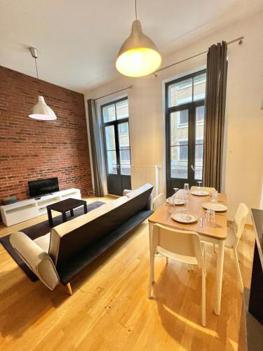 Una cama o camas en una habitación de Hyper centre appartement brussels