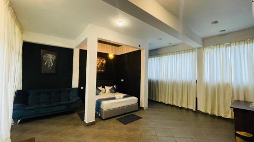 Postel nebo postele na pokoji v ubytování Blue Whale Resort & Kite Surfing